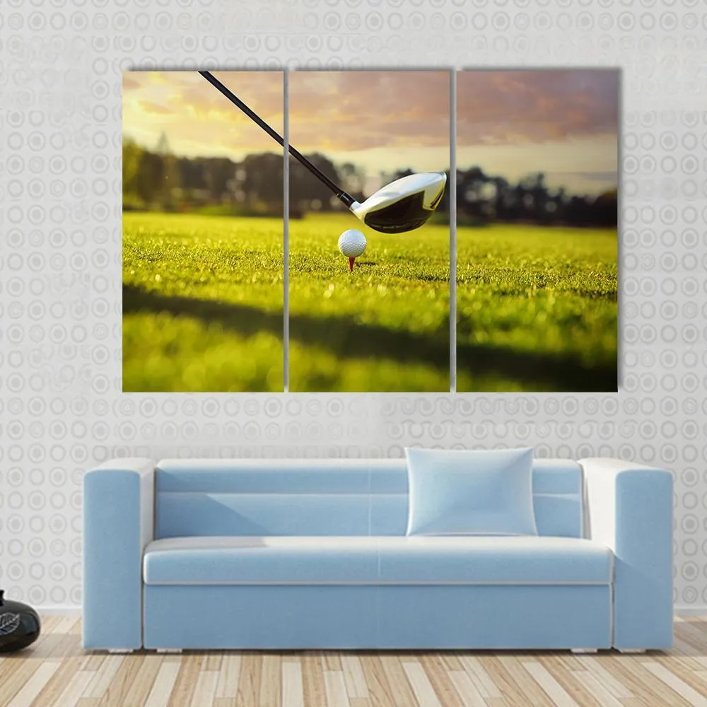 Golf Ball On Tee In Front Of Driver Canvas Wall Art