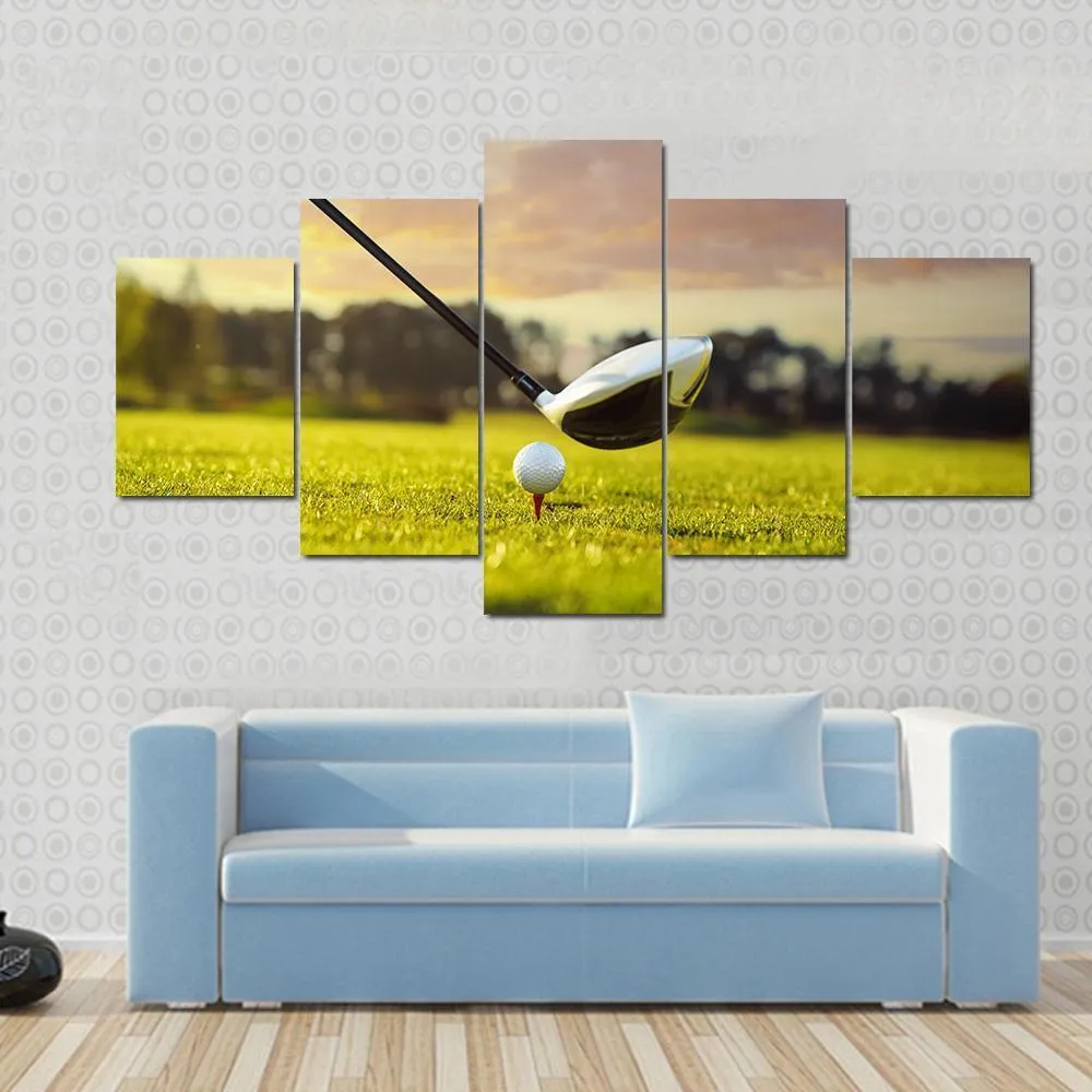 Golf Ball On Tee In Front Of Driver Canvas Wall Art